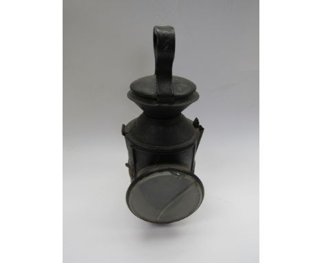 A GER style sliding knob three aspect hand lamp with reservoir and ceramic burner, glass a/f