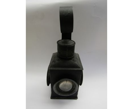 A black painted three aspect hanging lamp with ceramic burner and reservoir, one aspect a/f