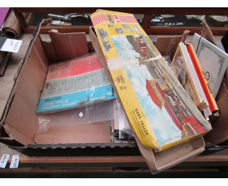 A box containing miscellaneous books all relating to railways, a quantity of model railway buildings 