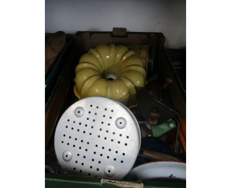 A box of mixed vintage kitchenalia including moulds etc 