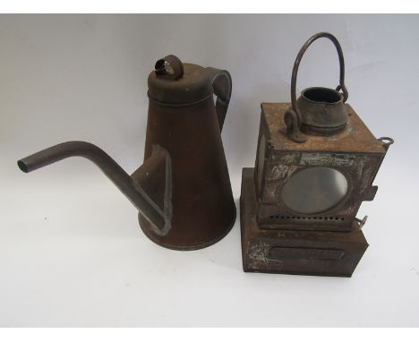 An LNER signal lamp interior stamped Yarmouth Vauxhall with metal burner and a front pouring oil can  (2)