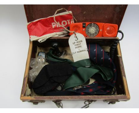 A wooden and leather suitcase containing mixed railway ephemera to include clothing, GNR spanner, telephone etc