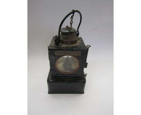 A LNER signal lamp interior with brass burner and wick