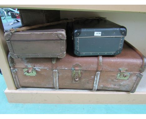 A wooden bound trunk and two cases 