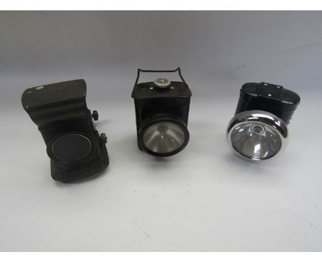 An early 20th Century Lucas two way oil lamp and two vintage battery lamps 