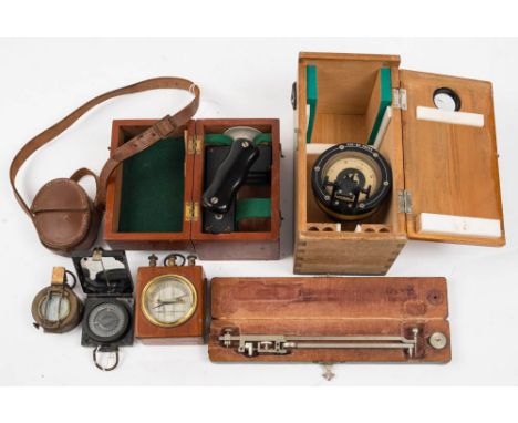A cased Marine Distance meter: together with a WWII brass MkII vernier compass in leather case, a Bakelite MK I magnetic marc