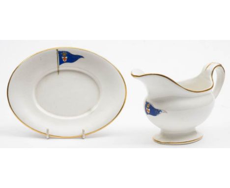 A Royal London Yacht Club earthenware sauce boat and stand by Bisto: with enamel pennant and gilt rim, retailer's marks to un