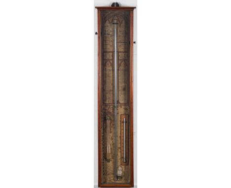 A late 19th/early 20th century oak  'Admiral Fitzroy' pattern barometer: of typical form with lithograph printed back papers,