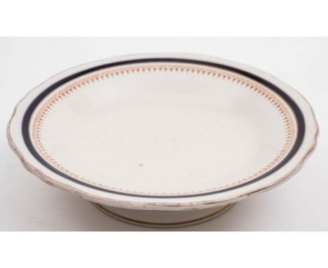 A Union Castle Line Ironstone tazza, by Ashworth Brothers: with blue, brown and gilt decorated border, blue underglaze factor