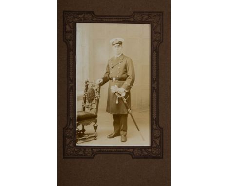 A full length studio portrait of F E Davies in Royal Navy uniform by Cooke of Plymouth:, image size 13 x 8cm.