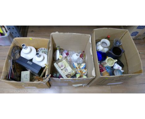 Three boxes of lamp bases, back scratchers, ceramics and ornaments, jugs etc