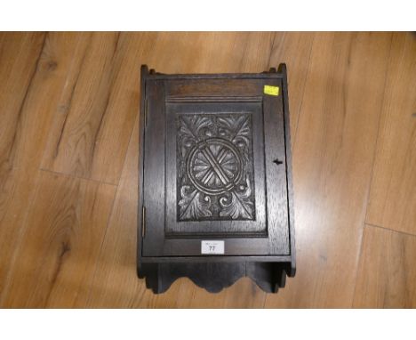 Small oak lockable wall mounted cabinet 