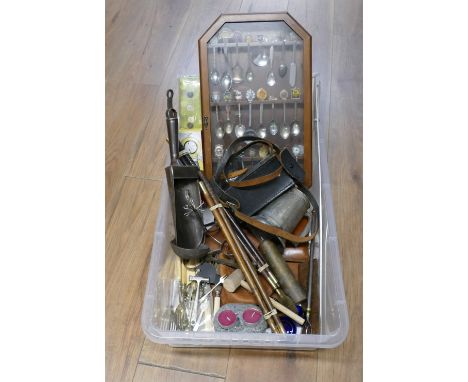 Fabric, display case containing collector spoons, gun cleaning rod, Wile Finish amp meter, cutlery, vintage metal scoop etc