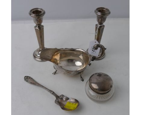 Pair of silver candlesticks with weighted bases, silver sauce boat spoon and silver lidded dressing table bottle - sauceboat 