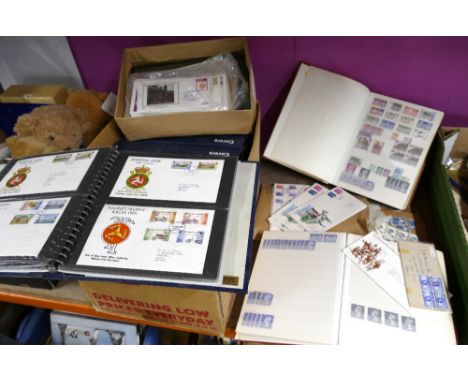 First Day covers in slip folders and stamp albums 