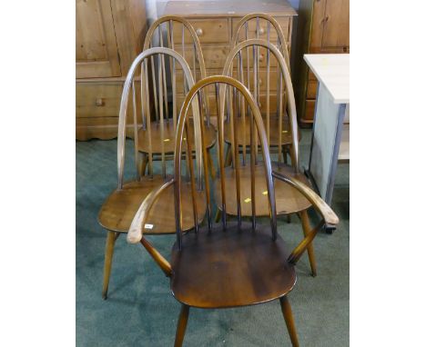 Five mid century Ercol spindle backed chairs, one carver