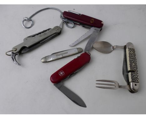 Collection of penknives including Swiss Army style. This bladed product is not for sale to people under the age of 18. By bid