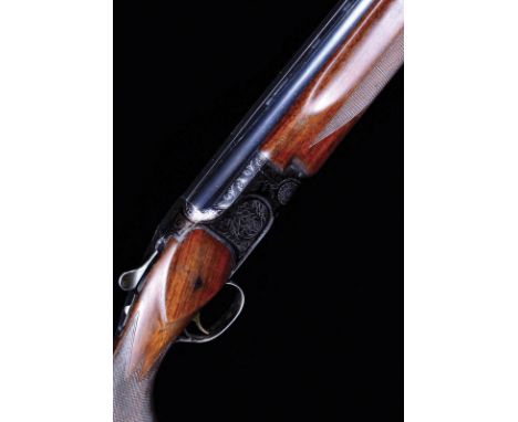Miroku A 12 bore single trigger over and under ejector, serial number 604203, 26 in. barrels, ventilated matt top rib, 2 3/4 