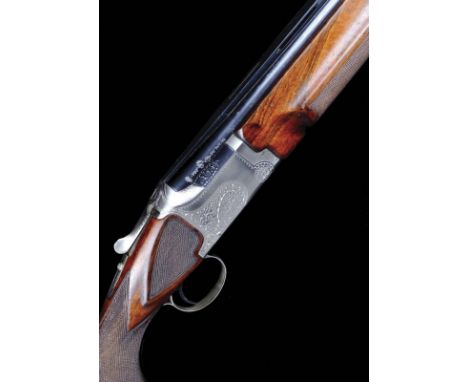 Winchester A 12 bore 'Pigeon Grade' single trigger over and under ejector, serial number PK392297, 30 in. barrels, ventilated