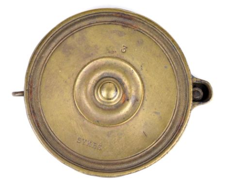 A Sykes brass rotary capper, marked 'SYKES' and '3'.