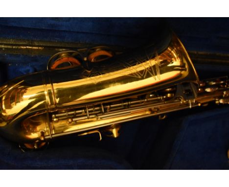 A brass saxophone, B &amp; M Champion, in wooden case