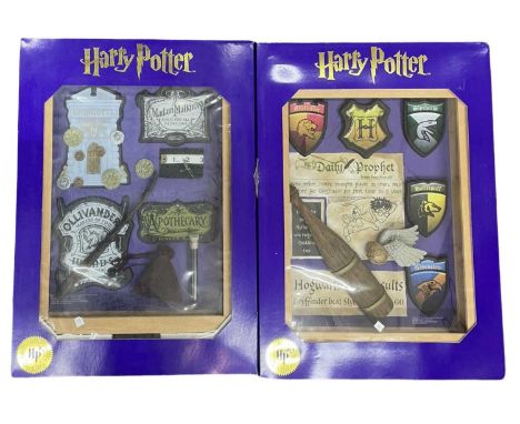 A pair of Limited Edition Harry Potter wall hangings by The Magic Cauldron - Diagon Alley and Quidditch