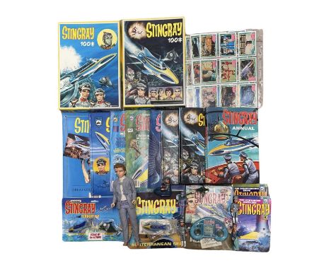 A collection of vintage Stingray memorabilia, to include annuals, jigsaw puzzles, action figures etc