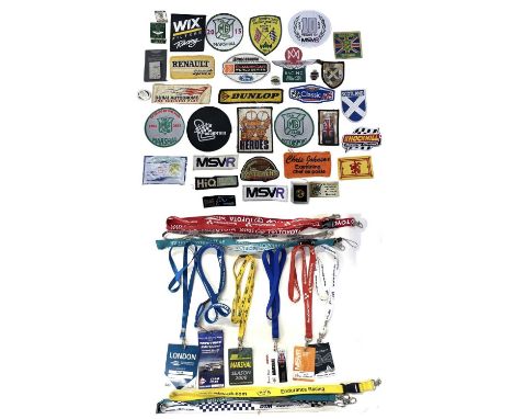 A collection of vintage British Racing patches and pin badges, together with a collection of British Motor Racing Marshall's 