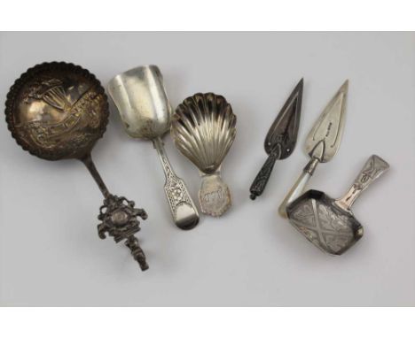 A MID-19TH CENTURY SILVER CADDY SPOON with decoratively engraved fiddle pattern handle, Glasgow 1851, together with; TWO OTHE