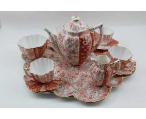 A VICTORIAN "WILEMAN &amp; CO." PORCELAIN CABARET TEA SET, comprising; petal rim tray, lobed lidded teapot, milk jug, sugar b