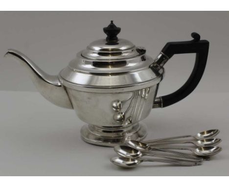BISHTON'S LTD A MID 20TH CENTURY SILVER TEAPOT, with hinged cover on circular platform base, Birmingham 1945, together with a
