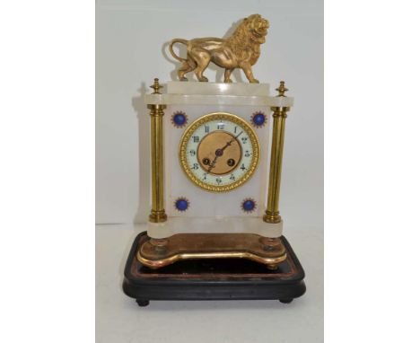 A 19TH CENTURY FRENCH MANTEL CLOCK, alabaster case with gilded cast metal lion mount, 8-day chiming movement, the circular di