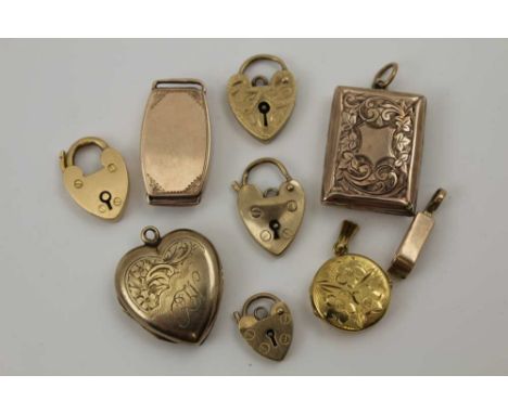 A 15CT GOLD PADLOCK CLASP, TWO 9CT GOLD PADLOCK CLASPS, TWO 9CT GOLD LOCKETS and items of yellow metal, the hallmarked 15ct i