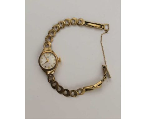 A 9CT GOLD LADY'S "MEDANA" COCKTAIL WATCH, 17 jewel movement, 9ct gold case and strap, with movement removed, but lens still 