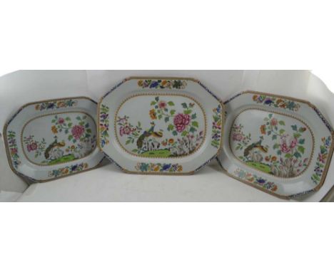 THREE SPODE STONE CHINA GRADUATED MEAT &amp; GAME PLATTERS, hand coloured transfer decorated with peacock and peonies, larges