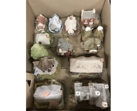 Three boxes containing assorted Liliput Lane cottages to include "The Farriers", "Sawrey Gill", "Purbeck Stores", "Fiveways C