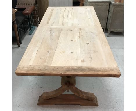 An elm plank top refectory style dining table on end pillar supports united by a centre stretcher, 239 cm long x 99.5 cm wide