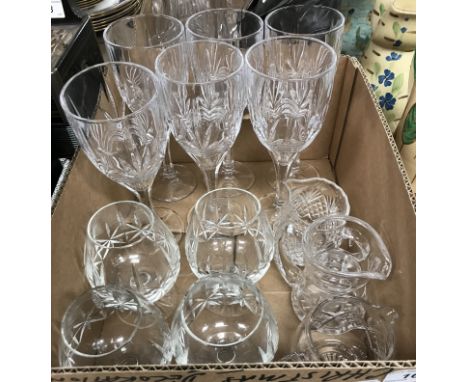 Two boxes of glassware to include a Stuart water jug, Brierley cream jug, a Georgian style cut glass decanter, a set of four 