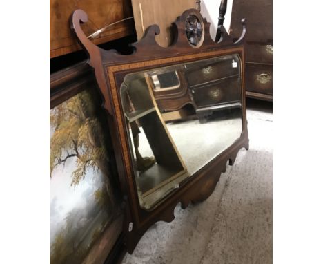 An Edwardian mahogany and inlaid fretwork carved wall mirror in the Georgian style, 96 cm wide x 76 cm high together with a m