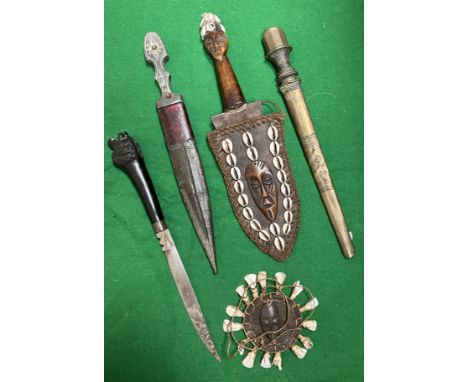 A 19th Century Greek Kindjal, Macedonia, the engraved shaped white metal handle with engraved blade depicting Islamic style m