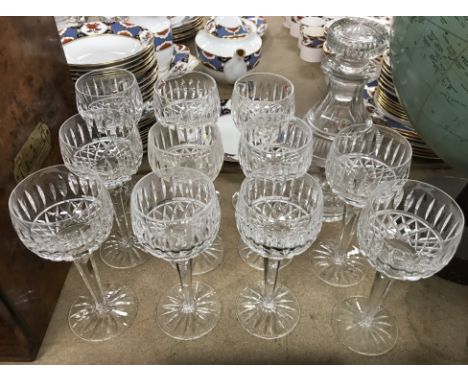 A set of eleven Waterford "Tramore" hock glasses together with a 19th Century cut glass decanter and a cased set of six Crown