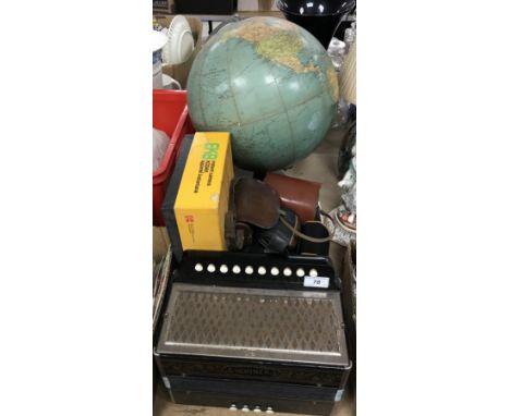 A Philips Challenge globe 13.5" diameter, 1957 together with a Hohner accordion with ten/four buttons and a box of cameras to