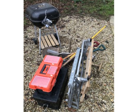 A collection of garden tools to include spades, forks and a broom, a small black barbecue and two tool boxes containing vario