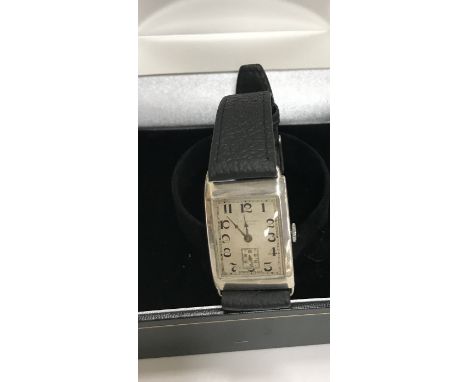 A 1930s silver cased wristwatch by J.W. Benson of London, the brushed dial set with Arabic numerals and secondary dial, the c