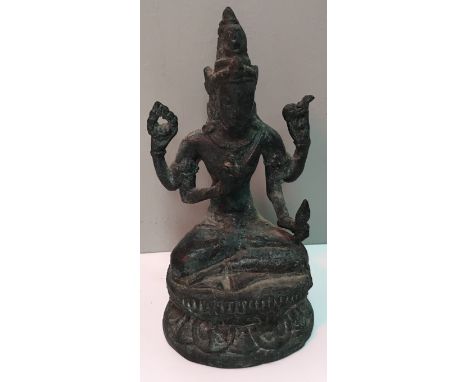 A bronze figure of Tara sat on a lotus flower base, 15 cm high together with a further bronze Buddha figure raised on lotus f