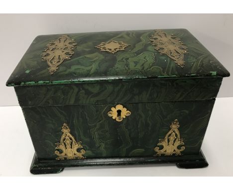A Victorian painted simulated malachite tea caddy with Gothic style pierced brass scrolling foliate embellishments, opening t