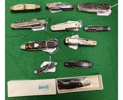 A collection of eleven various multi-function pen or pocket knives including a W.G. Whiting of Manchester plated cased exampl