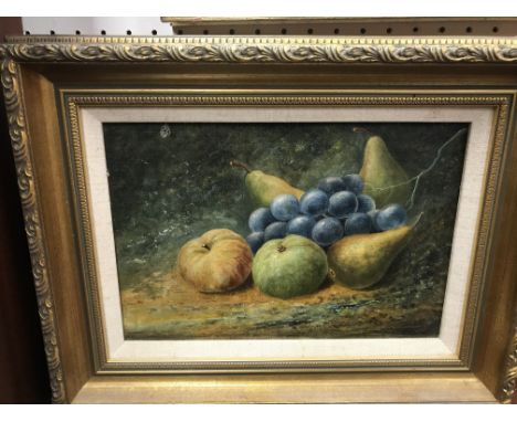 F VILLANUEVA "Fruit on mossy ledge", still life study of grapes, apples and pears, oil on canvas, signed and dated 1895 lower
