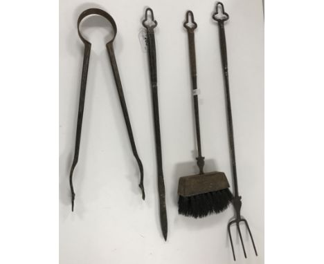 A composite set of three Cotswold School Arts and Crafts fire irons in the manner of Ernest Gimson, probably by Alfred Buckne