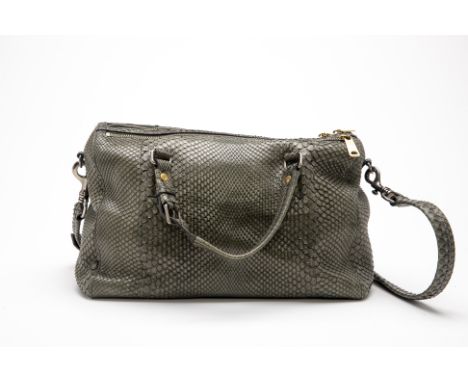 A CELINE KHAKI SNAKESKIN DUFFLE BAG
With a detachable and adjustable cross body strap, features three zipper compartments, wi